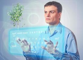 Young man with a virtual keyboard photo