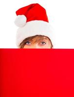 Christmas girl with red placard on white photo