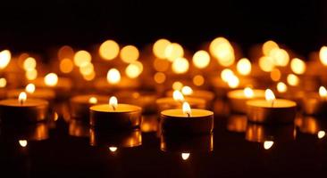 Burning candles with shallow depth of field photo