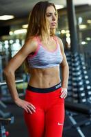 Woman working out at the gym photo