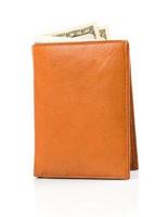 Banknotes dollars in leather brown purse on white photo