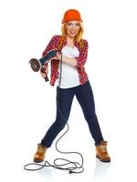 Female construction worker in a hard hat with angle grinder over white photo