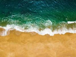 Top view of a deserted beach. The Portuguese coast of the Atlantic Ocean photo