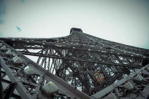 the tour eiffel photographed from below, on a summer day in 2012. The iron monument symbol of Paris, the capital of France photo