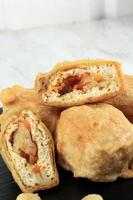 Gehu Pedas, Deep Fried Stuffed White Tofu with Chopped Mix Vegetables photo