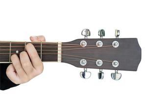 Hands playing guitar on white photo