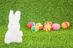 Easter bunny toy and Easter eggs photo