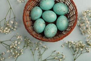 Pastel Easter eggs background. Spring greating card. Easter eggs in basket photo