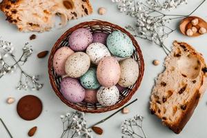 Pastel Easter eggs background. Spring greating card. Easter eggs in basket photo