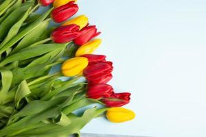 Banner with bouquet of tulips in pink and white colors. Concept of spring. Flowers background. photo