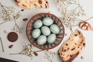 Pastel Easter eggs background. Spring greating card. Easter eggs in basket photo