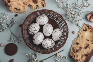 Pastel Easter eggs background. Spring greating card. Easter eggs in basket photo
