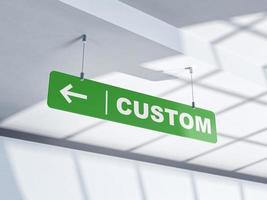 Custom, a green sign and an arrow indicating the direction. Customs area. photo