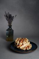 Blue Plate of Homemade Belgian Waffles on Grey concrete Background photo