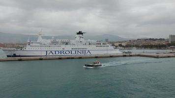 Ferry in front of the Split old town in Croatia photo