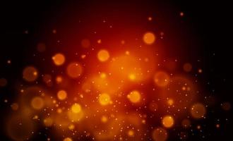 Sparkling dust particles. Glittering red golden dust. Abstract background with bokeh effect. photo