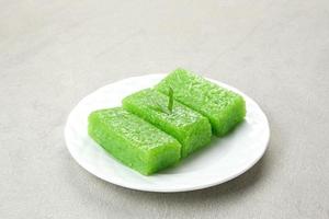 Wajik, traditional Indonesian snack made from steamed sticky rice, sugar, coconut milk, and pandan leaves. photo