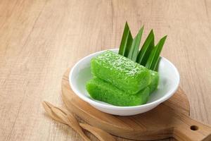 Wajik, traditional Indonesian snack made from steamed sticky rice, sugar, coconut milk, and pandan leaves. photo