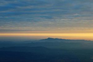 mountain at sunrise at view point at pha mak duk at phukradueng national park photo