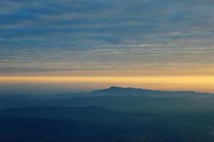 mountain at sunrise at view point at pha mak duk at phukradueng national park photo