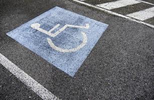 Disabled sign on the asphalt photo