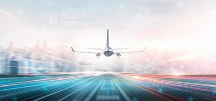 Technology digital future of commercial air transport concept, Airplane taking off from airport runway on city skyline and world map background with copy space, Moving by speed motion blur effect photo