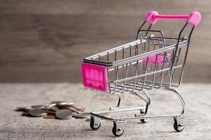 Shopping trolley on gray background with some copy space photo