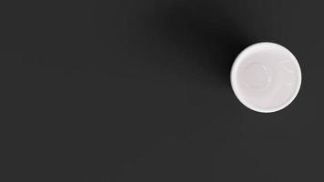 3d ceramic mug on black background, top view. Copy space. photo