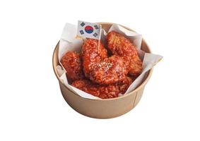 Spicy Korean Sauce Chicken on White Background photo