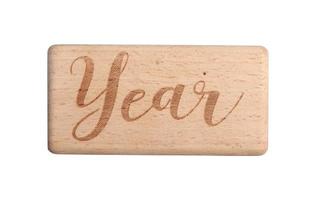 A wooden block showing the date of birth of a newborn child on a white background. photo