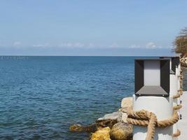 Piers in seaside resorts look luxurious, and suitable for relaxation. Suitable for tourists to enjoy the beauty of the sea. Makes you feel relaxed and calm, just come to relax at the sea during summer photo