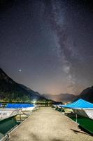 A jetty at night, the milk route can be seen in the sky photo