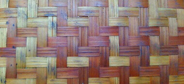 Defocused and noise image, Gedek is woven bamboo slats which are used as the walls of the house photo