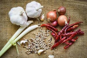 herbs and spices ingredients spicy for Tom Yum thai with lemon grass garlic dried chilli Shallot and pepper seed Thai Food Asian on sack photo