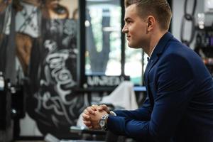 groom in the barber shop photo