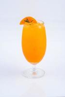 A smoothie orange juice. Beverage for summer on the white background. photo
