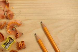 Pencil Sharpener on Wooden Background photo