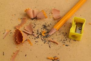 Pencil Sharpener on Wooden Background photo