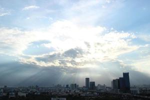 dark blue cloud and white blue sky background and city evening time with rainy cloudy time photo