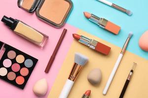 Composition with makeup brushes, beauty and makeup cosmetics and beauty makeup sponges. Beauty and makeup concept photo
