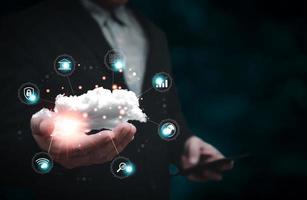 man holding cloud computing diagram show on hand. Data storage.Cloud technology.Secure backup and consistency Networking and internet service concept.Implementing storage technology in business photo