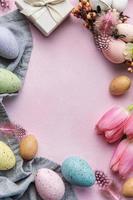 Pink tulips and Easter eggs background photo