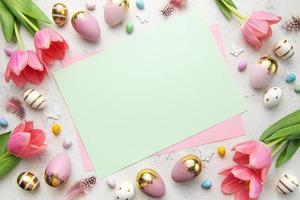 Pink tulips and Easter eggs background photo