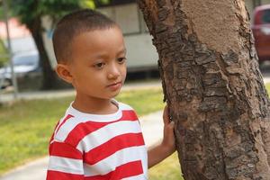 boy playing in the park photo