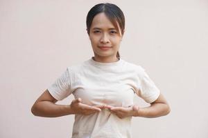 Asian woman having breast pain photo