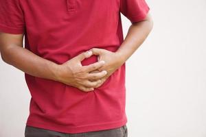 man having stomachache from gastritis photo