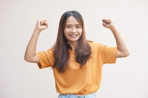 Asian woman smiles happily, brightly, cute photo