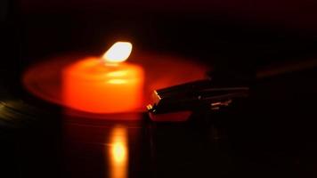 Candle light spinning over record vinyl video