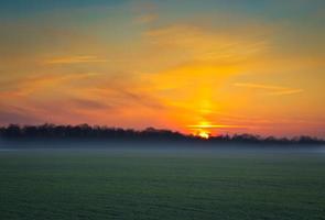 Landscape over the sunset photo