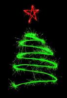Christmas tree made by sparkler photo